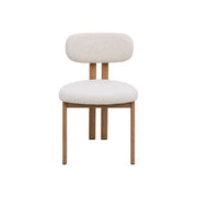 Silla de comedor nórdica acero nogal bouclé Ranya