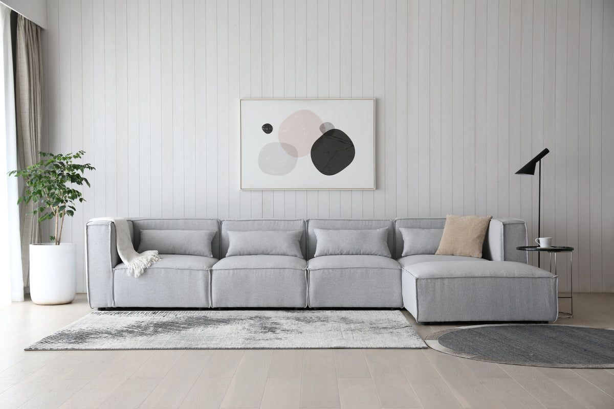 Sofá esquinero modular 4 plazas con puff gris Leila