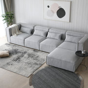 Sofá esquinero modular 4 plazas con puff gris Leila